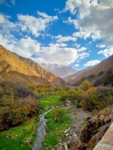 Beautiful mountain landscape in Imlil, Morocco with clear skies and vibrant greenery.